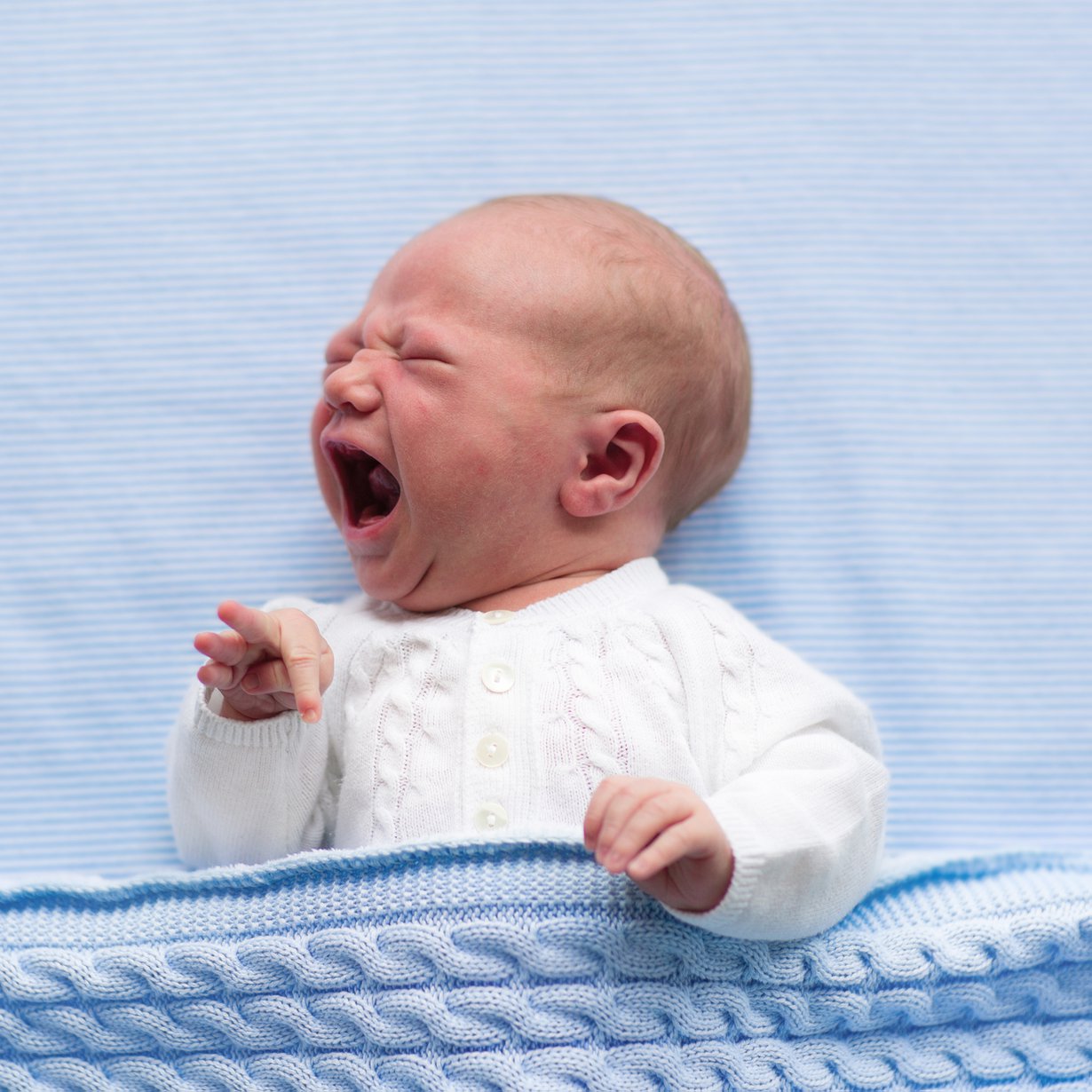 Vaikka vauvan itkun syytä ei heti ymmärtäisikään, tärkeintä on, että vauva voi luottaa siihen, että hän saa apua. Kuva: iStockphoto